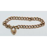 A 9 carat rose gold bracelet with heart padlock, 8.9g