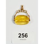 A 9 carat gold citrine swivel fob