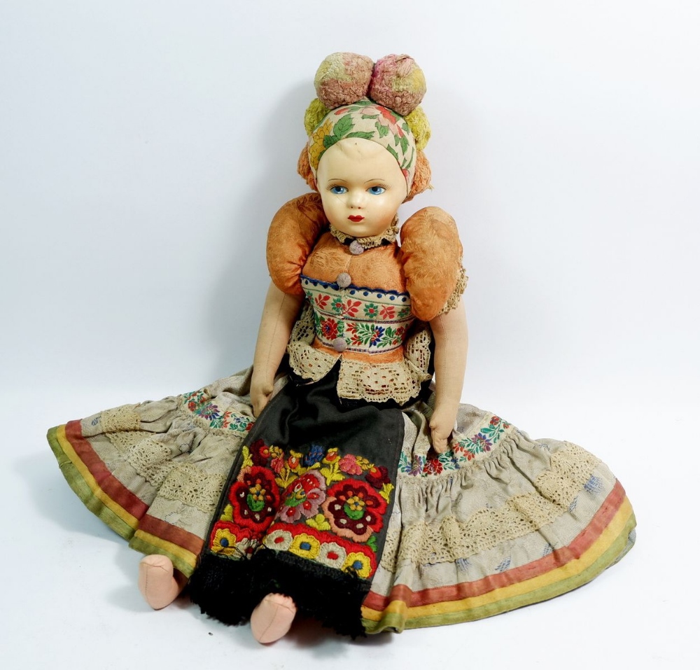 A vintage continental costume doll, 41cm tall