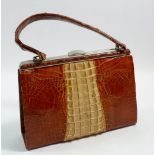 A crocodile skin vintage handbag