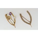 A 9 carat gold wishbone brooch set amethyst and pearl and another gold and seed pearl wishbone,