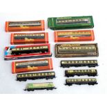 A box of Hornby carriages, mostly boxed