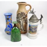 A group of pottery including military beer stein