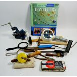 A box of jewellery making equipment