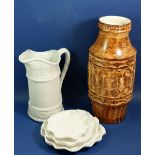 A Portmerion jug and three Portugese leaf plates plus an East German pottery vase