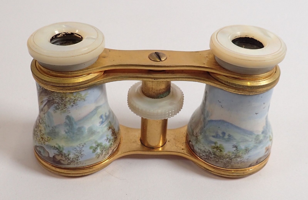 A pair of late 19th century enamelled opera glasses decorated rococo landscape scenes with mother of - Image 3 of 4