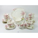 A Standard vintage tea service 'Spring Time' comprising: six cups and saucers, six tea plates,