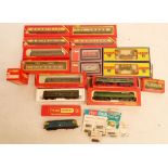 A box of various '00' gauge model railway trains, coaches, wagons etc. from Triang, Hornby, Lima and