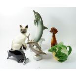 A group of animal ornaments to include Beswick cat, dolphin, Hungarian sturgeon, Italian bull and
