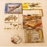 A group of unmade modelling kits, brick moulds etc including Revell Spitfire, Guillows WWI