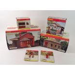 A collection of Hornby "00" railway accessories including Hornby Goods Shed R8582, Engine Shed