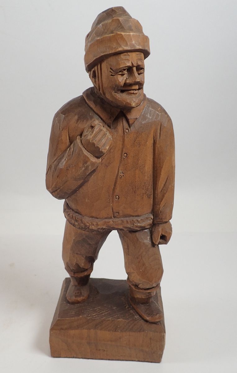 A Canadian Folk Art carved figure of a man by George Beauregard, 27cm - signed