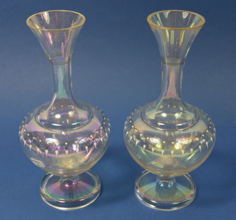 An Edwardian pair of lustred glass vases with beaded decoration, 18.5cm