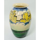 An Art Deco vase painted with a modernist city amongst clouds, PW painted monogram to base, with