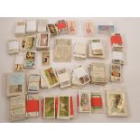 A collection of trade and cigarette cards including De Reszke, Churchman, Cavenders etc.