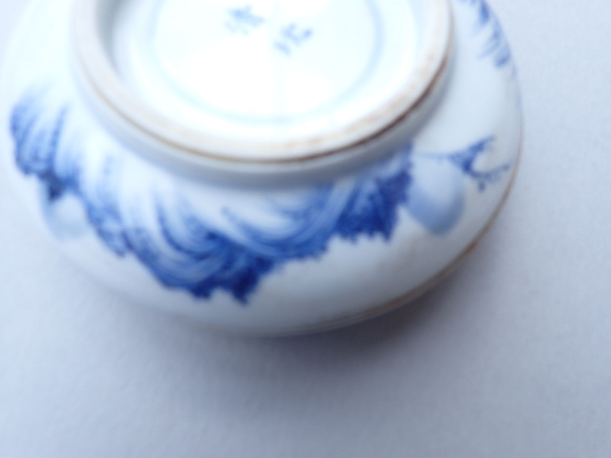 A Chinese blue and white traditional ink paste circular box decorated landscape motifs to top and - Image 6 of 9