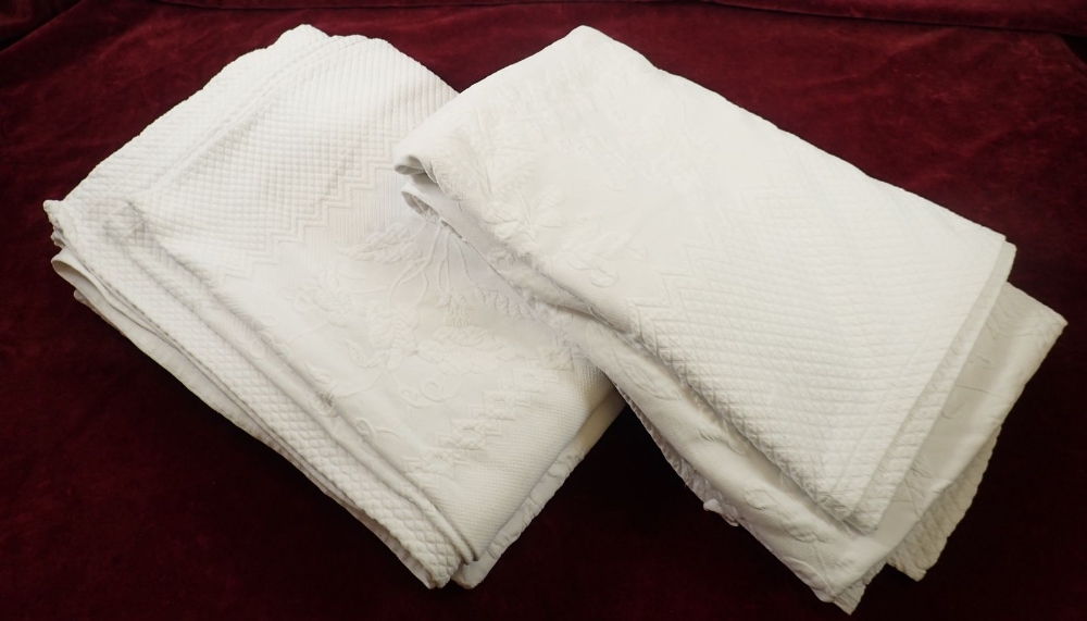 Two antique white cotton single bedspreads