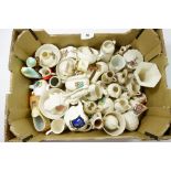 A box of Goss and crested china