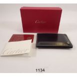A Cartier leather wallet, boxed