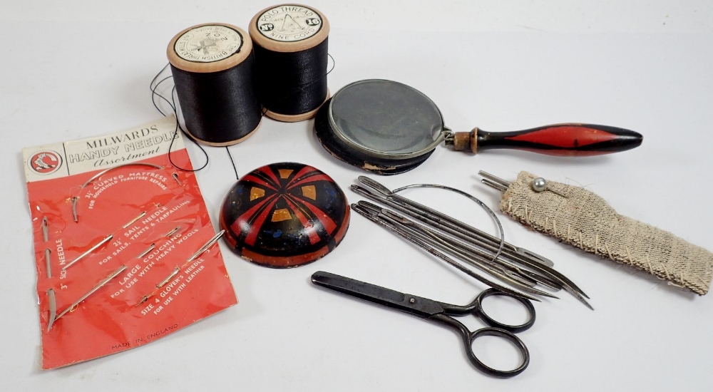 A collection of antique and vintage sewing items including assortment of large needles, cottons etc.