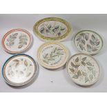 A set of eleven Denby Glyn Colledge leaf design dinner plates, 25.5cm diameter and one oval