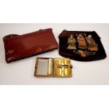 A vintage snakeskin handbag, an oriental silk bag and 5th Avenue make-up compact