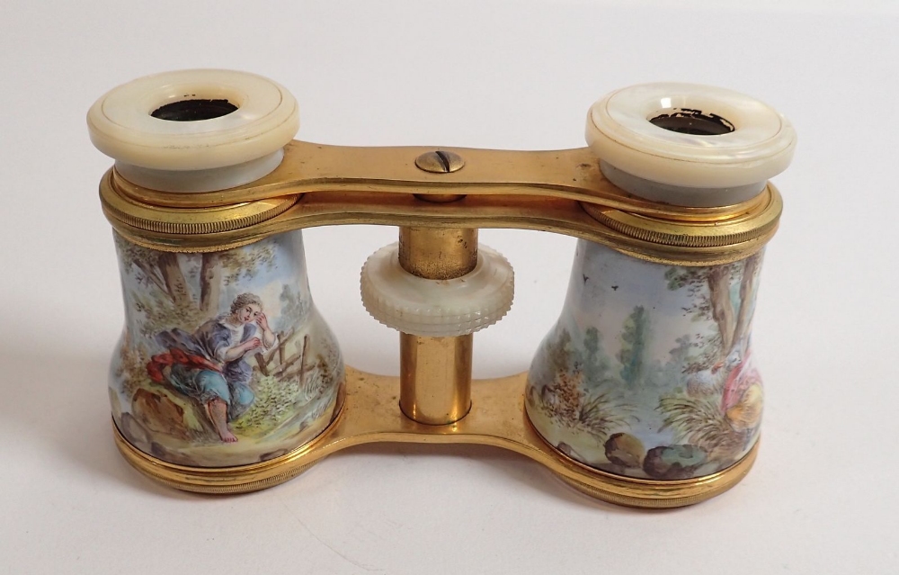 A pair of late 19th century enamelled opera glasses decorated rococo landscape scenes with mother of - Image 4 of 4