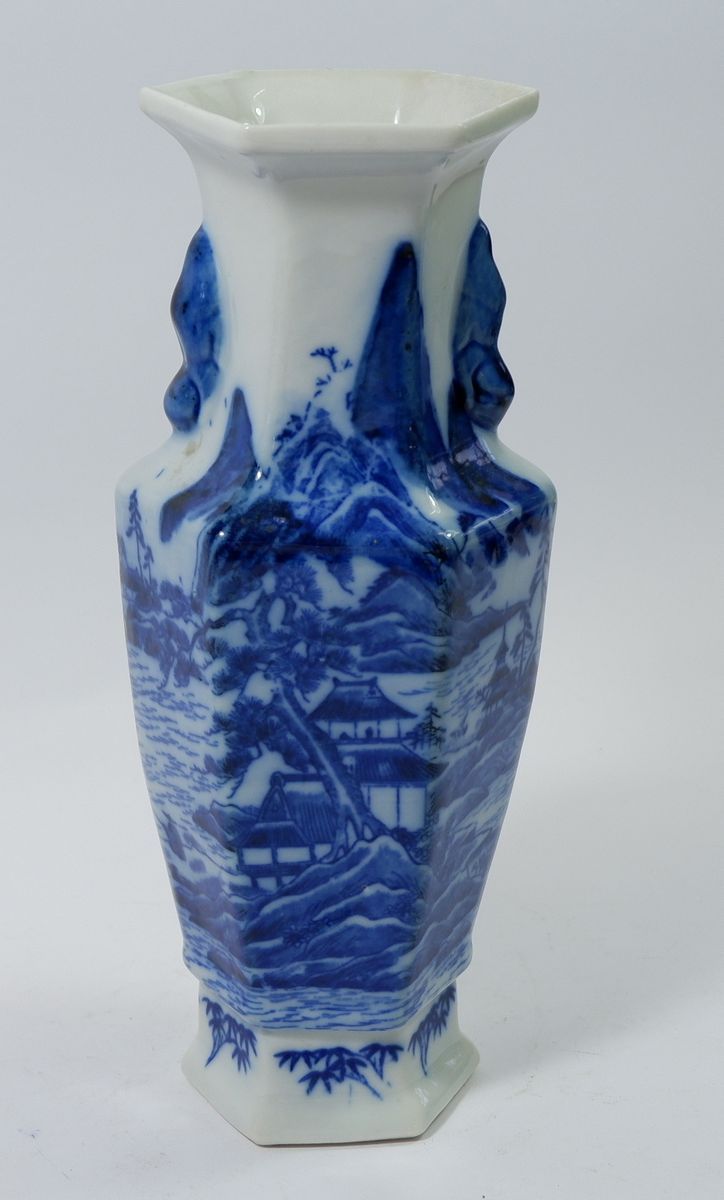 A Chinese blue and white vase painted mountainous landscape and lakes, script to reverse, 28cm