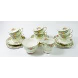 A Colclough vintage floral tea service comprising: six cups and five saucers, six tea plates, milk