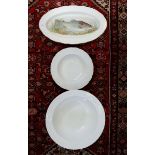 A white toiletry bowl, a white French bowl and a fish plate