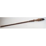 An old African wooden spear with flint blade and carved crocodile head motif, 82cm