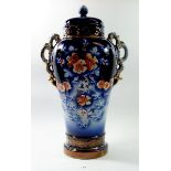 A Victorian pottery large floral vase and cover painted flowers, 52cm