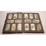 An old album of cigarette cards