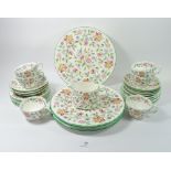 A Minton Haddon Hall tea and dinner service comprising six cups and saucers, six dinner plates,