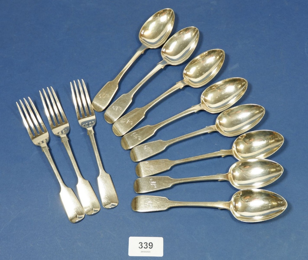 Eight silver dessert spoons and three forks, various dates, 426g