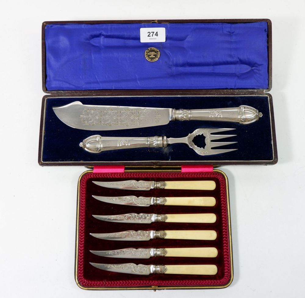 A pair of Victorian silver plated fish servers and a set of six seafood knives, cased