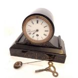 A Victorian small slate mantel clock with key and pendulum (recently serviced) 24cm wide