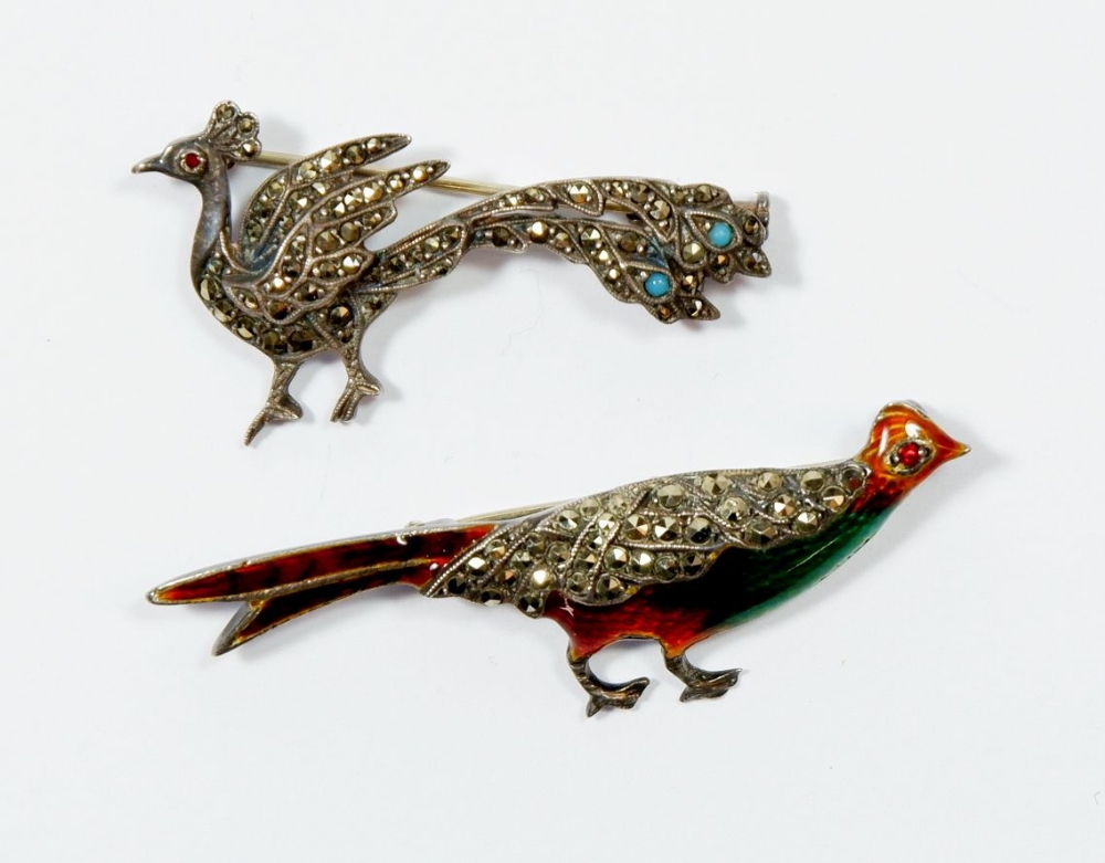 Two silver and marcasite bird brooches, one with enamel