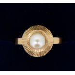 A gold ring set pearl, size Q, unmarked but tested as 14ct
