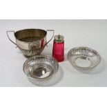 A cranberry and silver plated sugar caster, a silver plated sugar bowl and two silver plated pierced