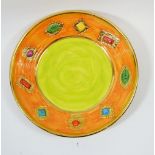 Mary Rose Young large orange and green pottery dish with jewelled decoration, 38ccm diameter