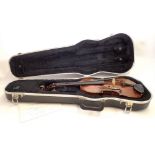 An 18th century French violin with two piece back and later German scroll, cased - 14" back