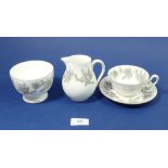 A Wedgwood Ashford tea service comprising: six cups and saucers, six tea plates, cake plate, milk