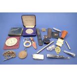 A box of collectables including a WWI Masonic medal, penknives etc.