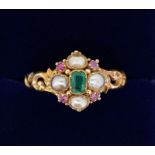 A Victorian gold ring set pearls and green and red stones, size Q
