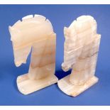 A pair of alabaster horse book ends, 15.5cm