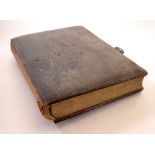 A Victorian leather bound album 'The Queen Album' containing approx 50 family photos, studio cards