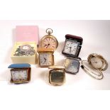 A group of various travel clocks including a retro design Terry example, Woodford and Europa etc.