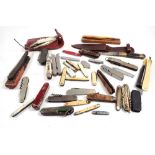 A quantity of old penknives and cut throat razors