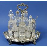 A Victorian silver plated and cut glass seven bottle cruet stand